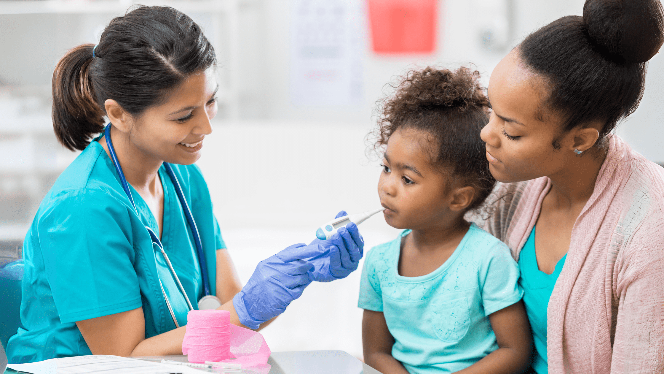 A medical school student on their pediatric clinical rotation treating a patient.